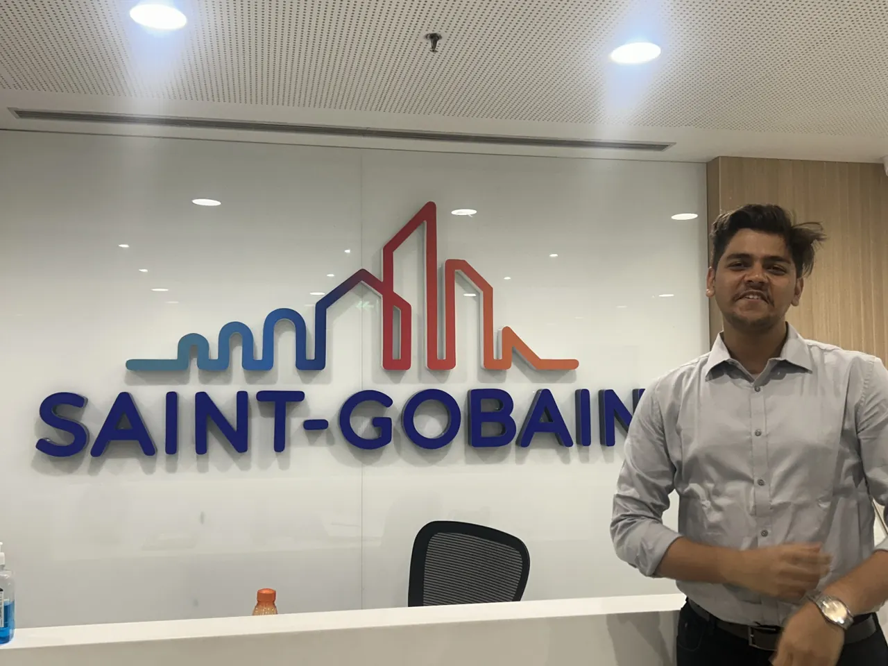 Aditya at the Saint-Gobain office reception during his internship